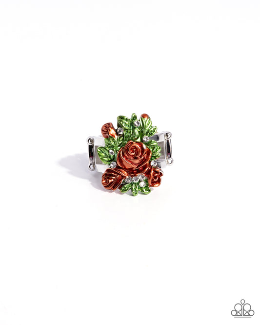 Dusted in white rhinestones, a collection of Tomato Cream rosettes bloom amongst matte green textured leaves for a glistening garden-inspired centerpiece. Features a stretchy band for a flexible fit.

Sold as one individual ring.