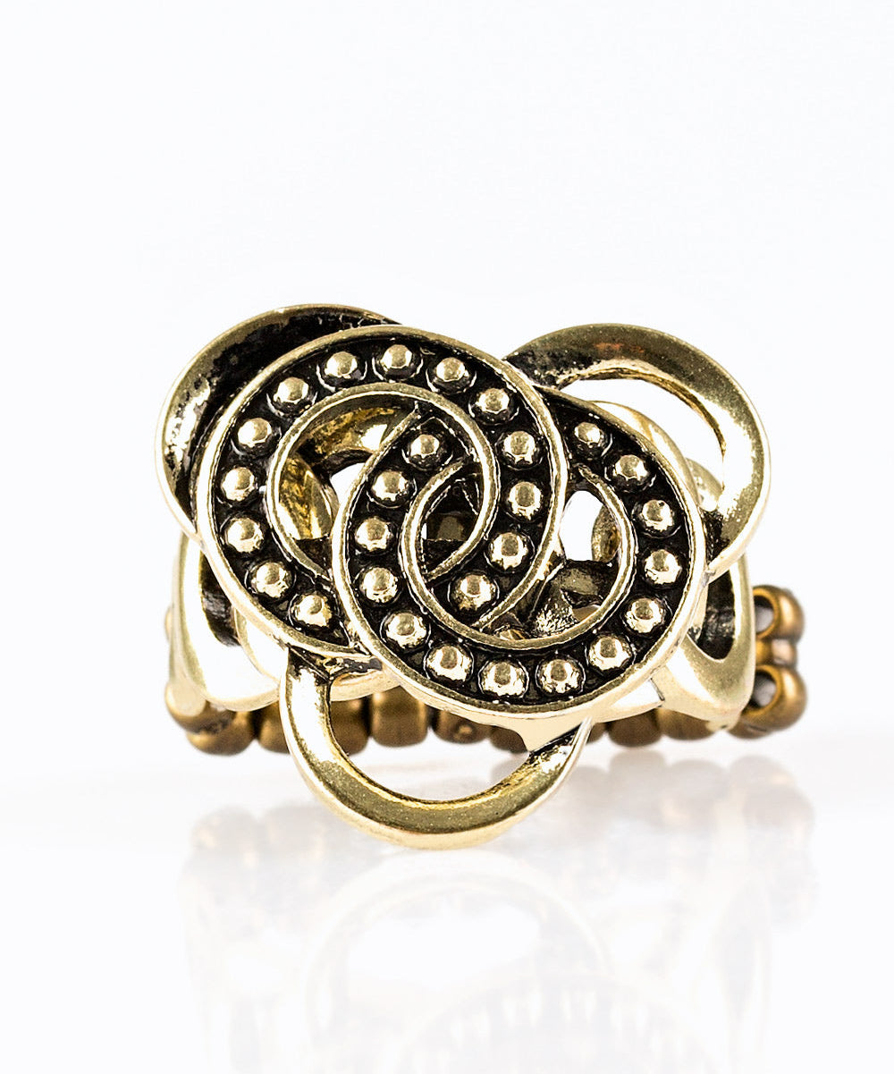Paparazzi Rings - Dizzying Distraction - Brass – jewelryandbling.com